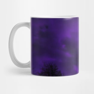 Clouds over the tree Mug